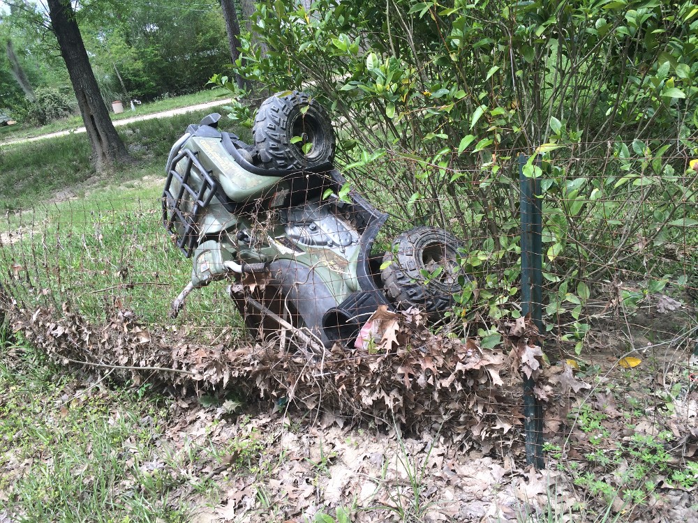 ATV Washed Up on a Fence in Texas